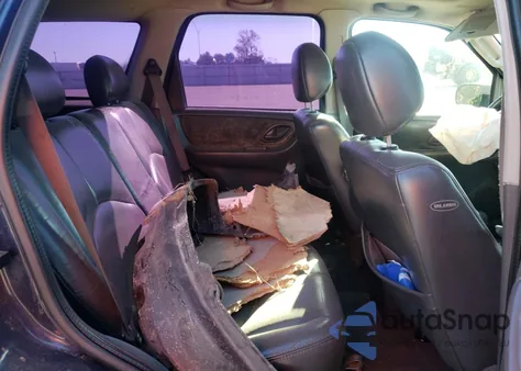 2003 Mazda Tribute Es z USA, uszkodzony, nr VIN 4F2CZ06103KM38447